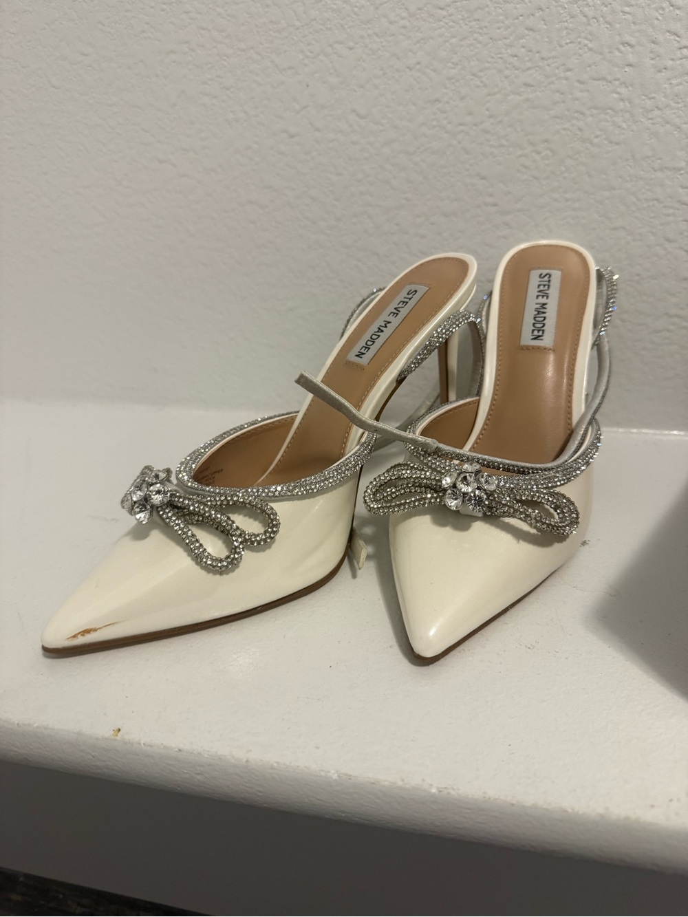Steve Madden Ivory Patent Pointed Toe Slingback Heels with Crystal Bow Accent